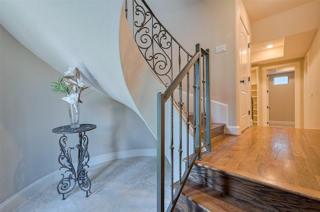 stairway with baseboards