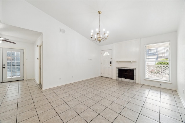 10314 Sommerville Ave, Houston, TX 77041 - unfurnished living room with vaulted ceiling, a healthy amount of sunlight, light tile patterned floors, and visible vents