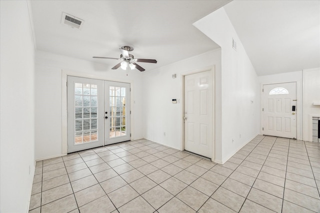 10314 Sommerville Ave, Houston, TX 77041 - foyer entrance with ceiling fan, light tile patterned floors, visible vents, and french doors