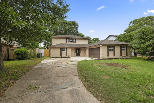 1819 Redwood Ct, Sugar Land, TX 77498 - view of front of house featuring fence, an attached garage, brick siding, driveway, and a front lawn