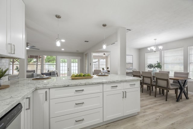1819 Redwood Ct, Sugar Land, TX 77498 - kitchen with a peninsula, dishwashing machine, light wood-style flooring, and white cabinets