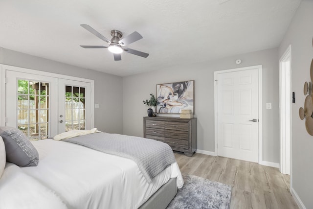 1819 Redwood Ct, Sugar Land, TX 77498 - bedroom featuring light wood finished floors, baseboards, french doors, and access to exterior