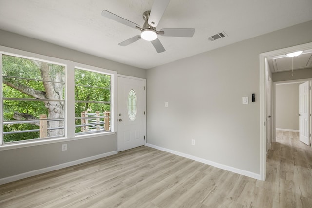 1819 Redwood Ct, Sugar Land, TX 77498 - entrance foyer featuring light wood-style floors, visible vents, baseboards, and ceiling fan