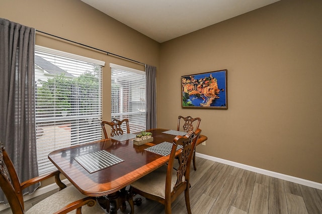 14022 Cypress Falls Dr, Cypress, TX 77429 - dining area featuring light wood-style flooring and baseboards