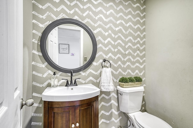 1985 Eastridge Ln, Madisonville, TX 77864 - half bathroom featuring toilet and vanity