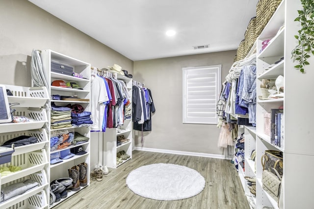 1985 Eastridge Ln, Madisonville, TX 77864 - spacious closet with visible vents and wood finished floors