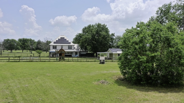 1985 Eastridge Ln, Madisonville, TX 77864 - view of yard featuring a fenced backyard and a rural view