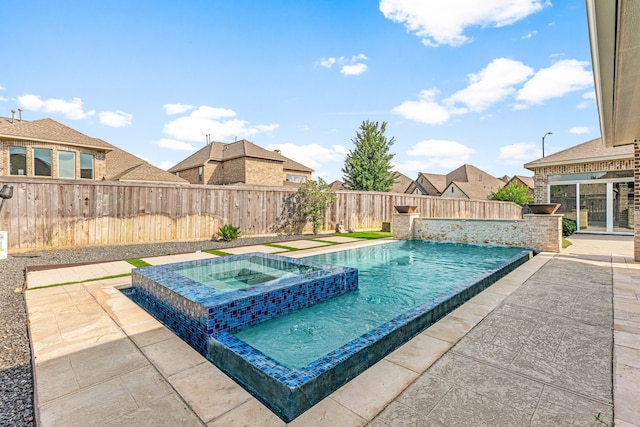 16202 Coyote Run Ln, Cypress, TX 77433 - view of pool featuring a patio, a fenced backyard, and a pool with connected hot tub