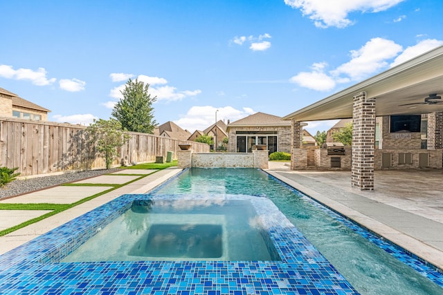 16202 Coyote Run Ln, Cypress, TX 77433 - view of swimming pool with area for grilling, a ceiling fan, a fenced backyard, a patio area, and a pool with connected hot tub