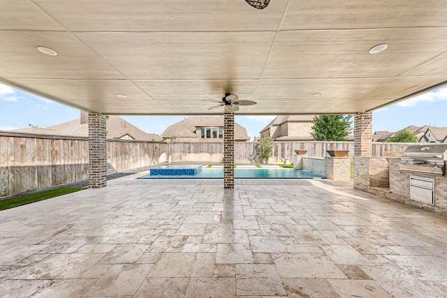 16202 Coyote Run Ln, Cypress, TX 77433 - fenced backyard with area for grilling, a patio area, and ceiling fan