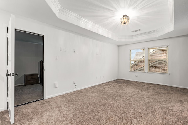 16202 Coyote Run Ln, Cypress, TX 77433 - spare room featuring a raised ceiling, crown molding, and carpet