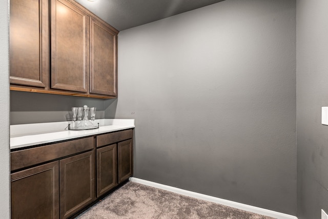 16202 Coyote Run Ln, Cypress, TX 77433 - bar area featuring light colored carpet and baseboards