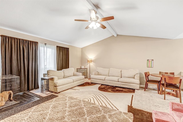 living room featuring a ceiling fan and lofted ceiling with beams