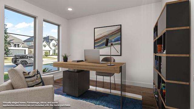 office space with baseboards, recessed lighting, and wood finished floors