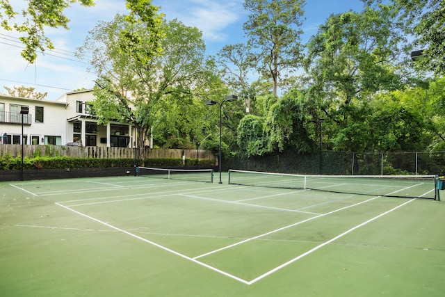 179 Litchfield Ln, Houston, TX 77024 - view of tennis court with community basketball court