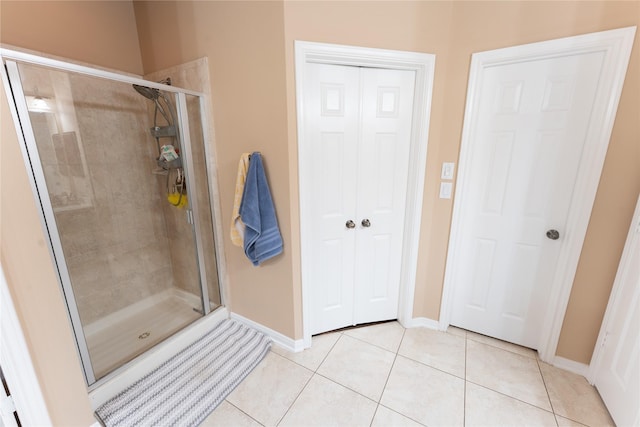 3519 Maverly Crest Ct, Katy, TX 77494 - full bath with a shower stall, tile patterned flooring, and baseboards