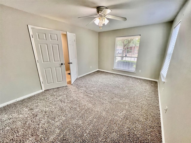 21618 Falvel Lake Dr, Spring, TX 77388 - carpeted spare room featuring baseboards and a ceiling fan