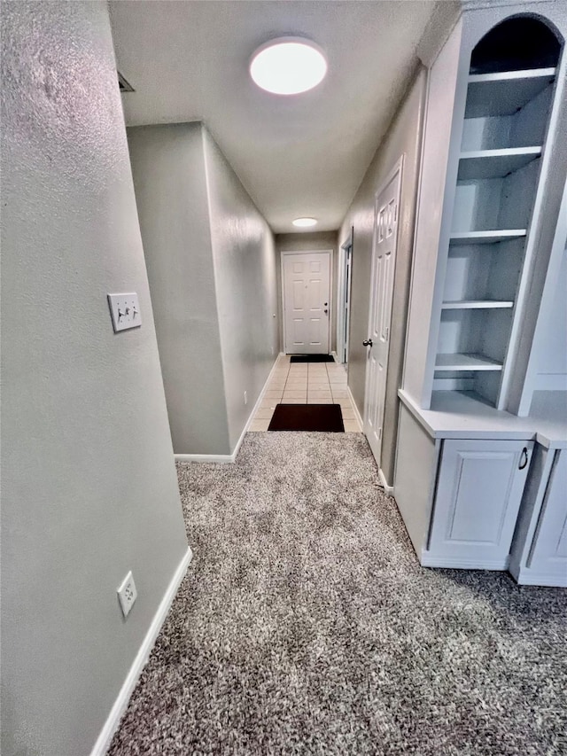 21618 Falvel Lake Dr, Spring, TX 77388 - corridor with light carpet and baseboards
