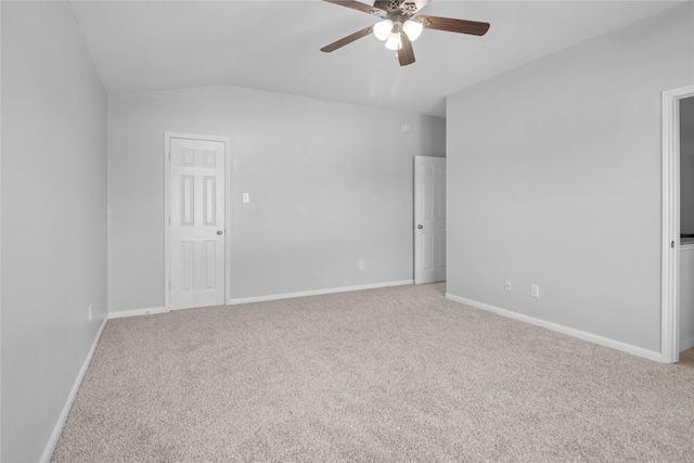 21618 Falvel Lake Dr, Spring, TX 77388 - unfurnished bedroom with baseboards, lofted ceiling, a ceiling fan, and light colored carpet