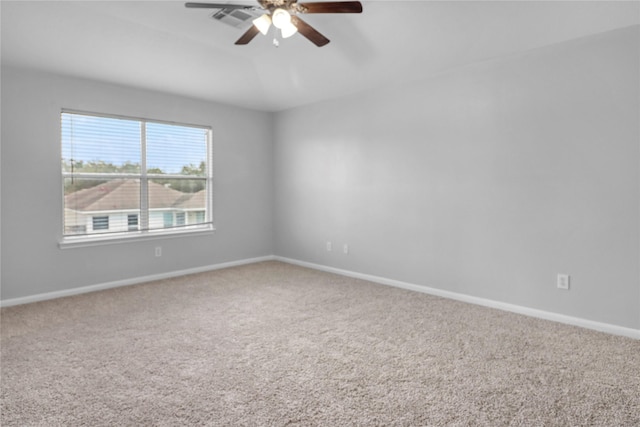 21618 Falvel Lake Dr, Spring, TX 77388 - empty room with carpet, baseboards, a ceiling fan, and visible vents