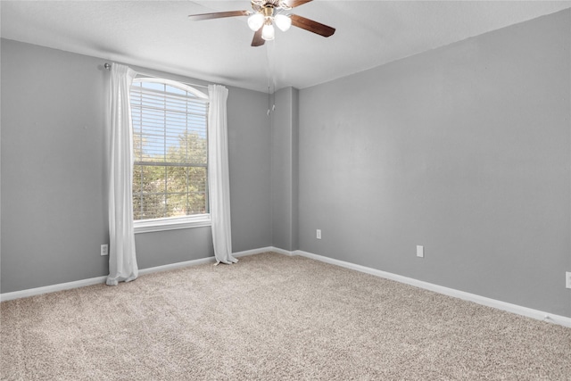 21618 Falvel Lake Dr, Spring, TX 77388 - carpeted empty room featuring a ceiling fan and baseboards