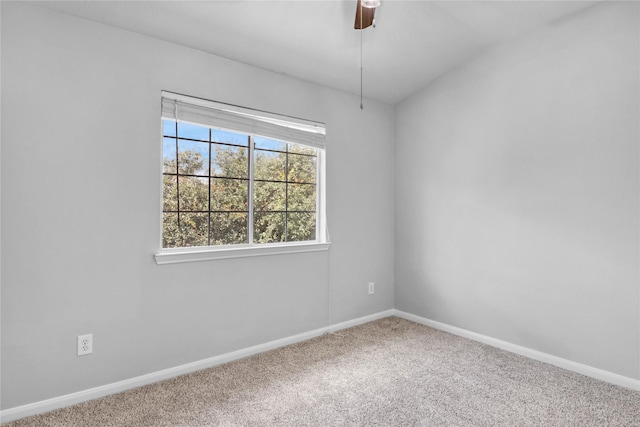 21618 Falvel Lake Dr, Spring, TX 77388 - spare room featuring ceiling fan, lofted ceiling, carpet flooring, and baseboards