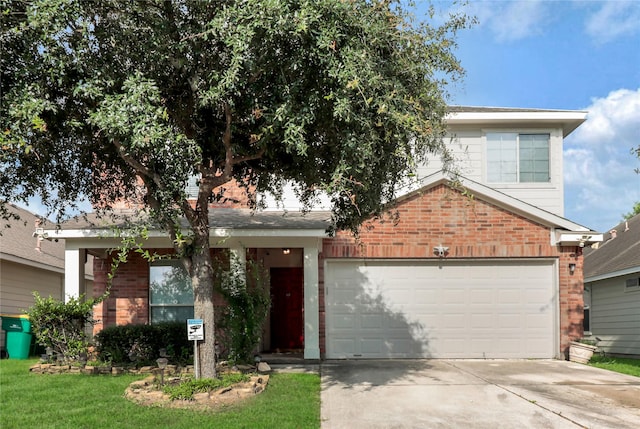 21618 Falvel Lake Dr, Spring, TX 77388 - view of front of home featuring driveway, brick siding, a garage, and a front yard