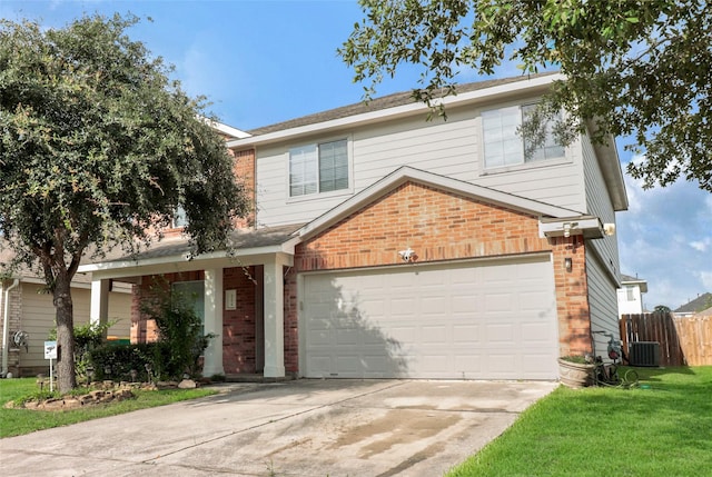 21618 Falvel Lake Dr, Spring, TX 77388 - traditional-style house featuring brick siding, fence, central AC, concrete driveway, and a front yard