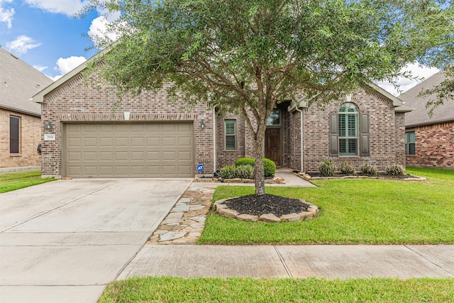 view of front of house featuring concrete driveway, a front yard, brick siding, and a garage