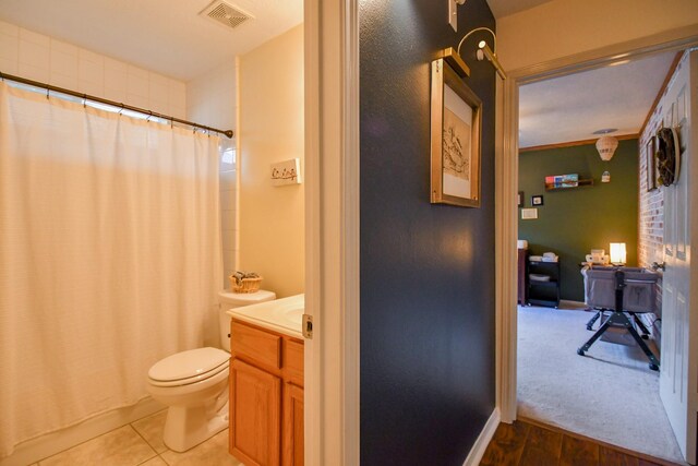 full bath with toilet, curtained shower, vanity, and wood finished floors
