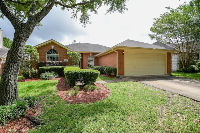 ranch-style house featuring a garage, concrete driveway, brick siding, and a front lawn
