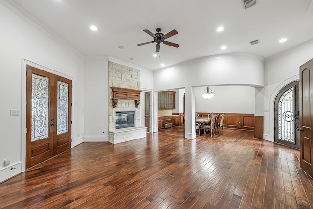 1006 Cross Hollow Ln, Katy, TX 77494 - entryway with french doors, dark wood-style flooring, ceiling fan, visible vents, and crown molding