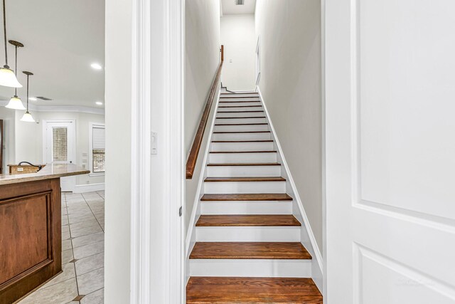 1006 Cross Hollow Ln, Katy, TX 77494 - stairway featuring recessed lighting and ornamental molding