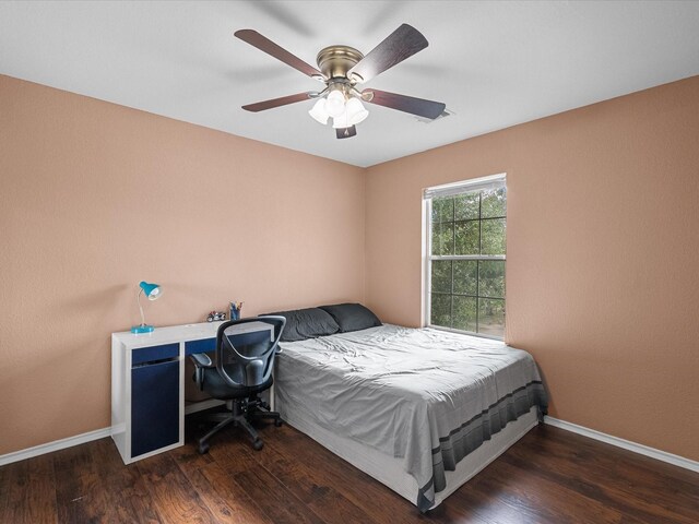 7914 Cypress Edge Dr, Cypress, TX 77433 - bedroom with baseboards, wood finished floors, and ceiling fan
