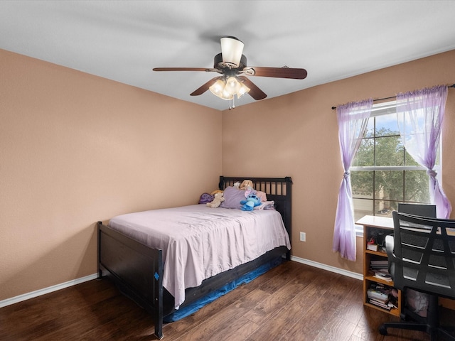 7914 Cypress Edge Dr, Cypress, TX 77433 - bedroom with wood finished floors, baseboards, and ceiling fan