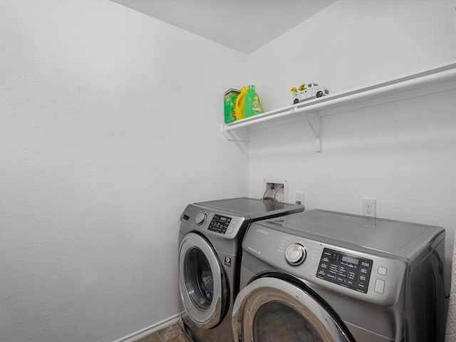 7914 Cypress Edge Dr, Cypress, TX 77433 - washroom with washing machine and dryer and baseboards