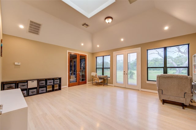 2418 Majestic Oaks Ct, Rosharon, TX 77583 - living area featuring visible vents, french doors, and lofted ceiling