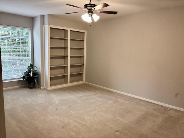 6314 1st St, Bellaire, TX 77401 - carpeted empty room with ceiling fan, baseboards, and plenty of natural light