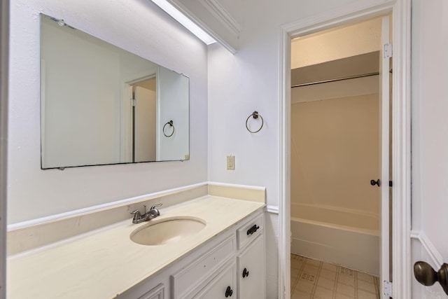 bathroom with vanity, bathing tub / shower combination, and tile patterned floors