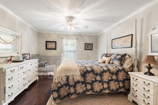 bedroom with dark wood finished floors, a ceiling fan, ornamental molding, and a textured ceiling