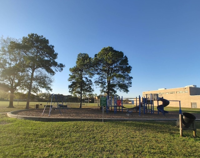 communal playground with a lawn