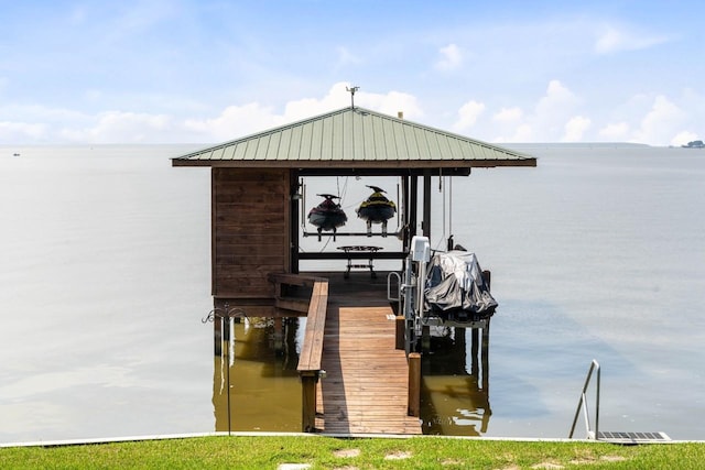 650 Dove Is, Livingston, TX 77351 - view of dock with boat lift and a water view