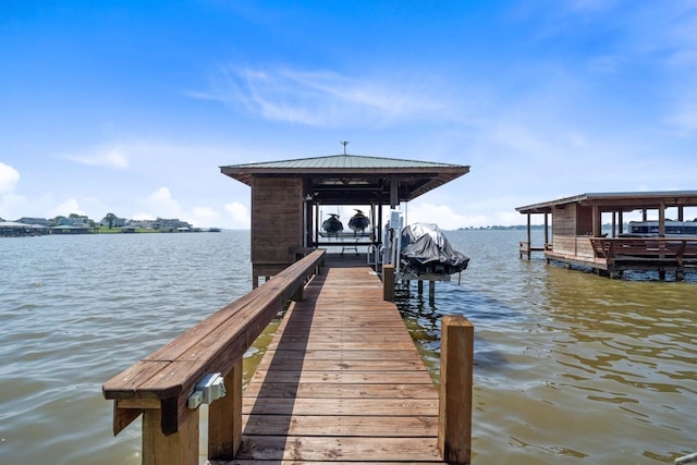 650 Dove Is, Livingston, TX 77351 - view of dock featuring a water view and boat lift