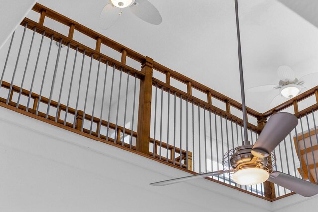 650 Dove Is, Livingston, TX 77351 - stairs featuring a ceiling fan