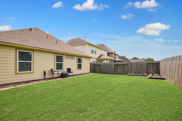 2614 Magnolia Fair Way, Spring, TX 77386 - view of yard with an outdoor fire pit and a fenced backyard