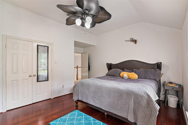 bedroom featuring vaulted ceiling, wood finished floors, and ceiling fan