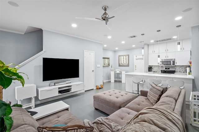 9850 Pagewood Ln Unit 1302, Houston, TX 77042 - living area featuring finished concrete floors, visible vents, recessed lighting, crown molding, and ceiling fan