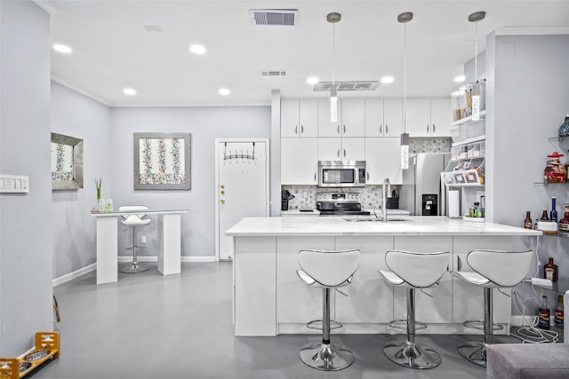 9850 Pagewood Ln Unit 1302, Houston, TX 77042 - kitchen with a sink, stainless steel appliances, backsplash, and visible vents