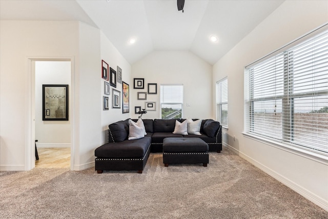 1210 Persimmon Pass, Fischer, TX 78623 - living area with carpet flooring, lofted ceiling, baseboards, and ceiling fan