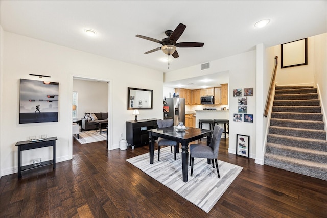 1210 Persimmon Pass, Fischer, TX 78623 - dining area featuring stairway, a ceiling fan, wood finished floors, and baseboards
